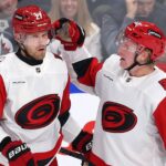 Ehlers strikes late against his old team, opening the Hurricanes' trip with a win