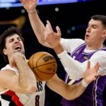 Ja Morant, Damian Lillard lead unbeaten Trail Blazers past Lakers 136-129 despite Luka Doncic's 41