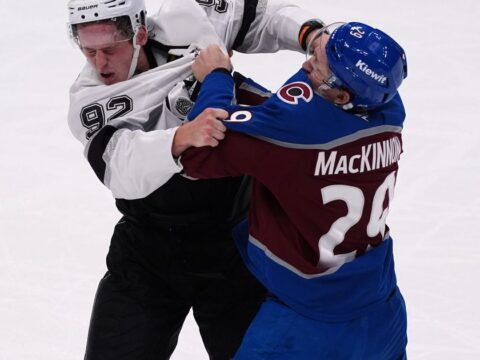 MacKinnon has 2 goals and a rare fight in the Avs’ 8-4 victory over the Kings in opener