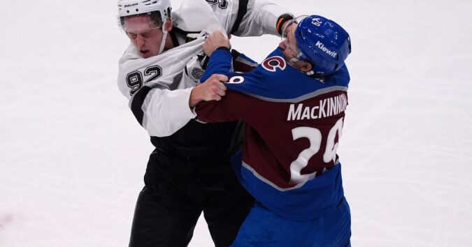 MacKinnon has 2 goals and a rare fight in the Avs’ 8-4 victory over the Kings in opener