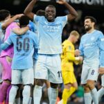 Man City and Liverpool win penalty shootouts to advance in English League Cup