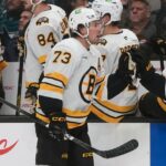 McAvoy scores in his 1st game back from a suspension to lead the Bruins past the Sharks 6-3