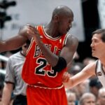 Michael Jordan jersey sets $14 million record for basketball memorabilia, auction house says