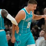 Naz Reid has 20 points and 11 rebounds in his Charlotte debut as the Hornets beat the Nets 110-103