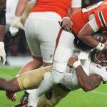 No. 3 Miami hangs on to beat Florida State, 43-35 in a double-overtime thriller