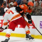 Pospisil's tiebreaking third-period goal pushes Flames to first win of the season, 4-2 over Ducks
