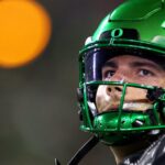Raiola's 4-yard touchdown pass with 28 seconds left gives Oregon a 17-14 win over Nebraska