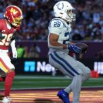Taylor runs for 2 TDs and Colts beat Commanders 30-13 in London