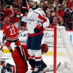Tuch scores twice in his first game for Washington, helping the Capitals beat the Hurricanes 5-2