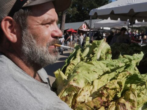 Whether `stringing’ or `looping,’ tobacco is the tie that binds many North Carolina farm families